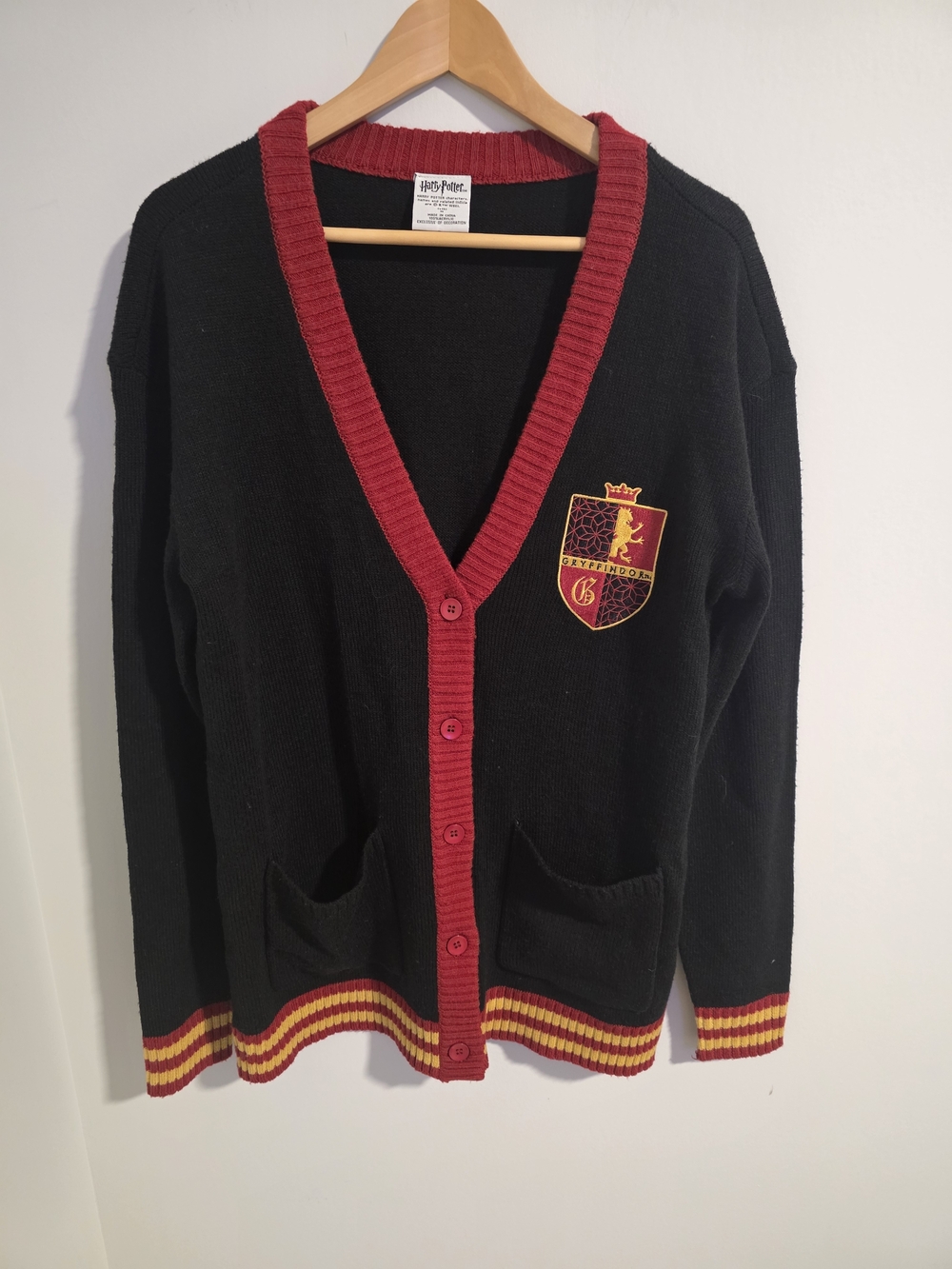 Harry Potter GryffindWarner Bros. Gryffindor Black Cardigan with Red & Gold Trim - Picture 1 of 5